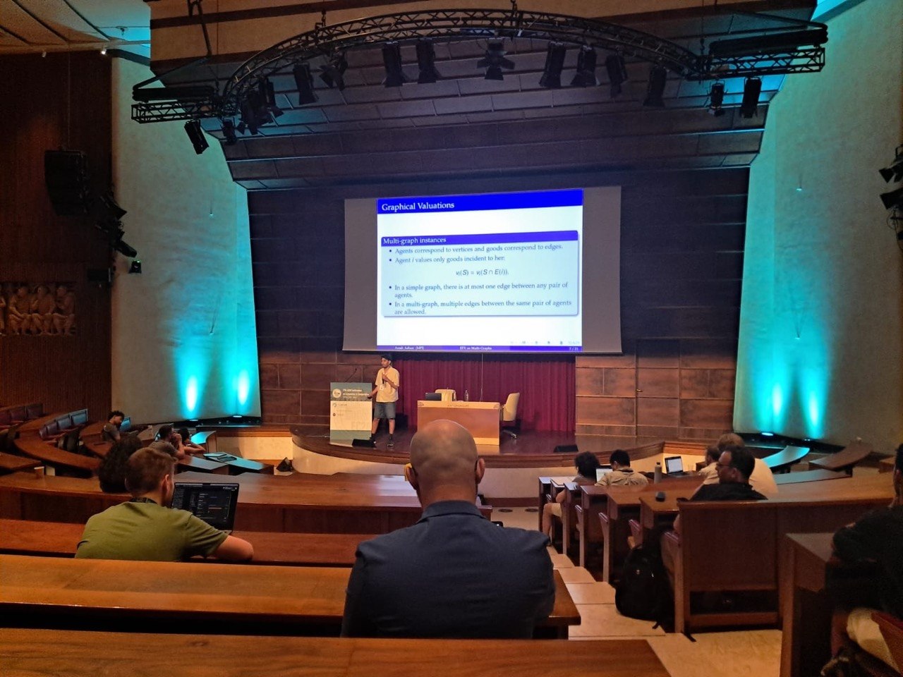 Arash Ashuri presenting at EC 2026